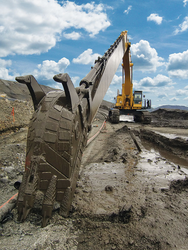 Slurry wall construction via conventional trenching. Forgen Geotechnical Construction